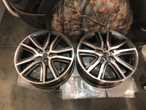 2019 Ford Everest - A pair of aftermarket alloy wheels are shown, likely for a truck or SUV, with a distinctive multi-spoke pattern.