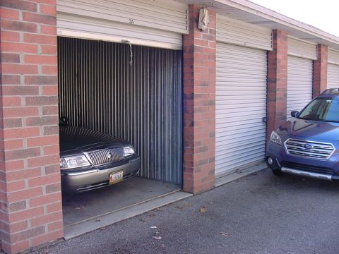 2003 Mercury Grand Marquis - New storage unit with the Subie in waiting.