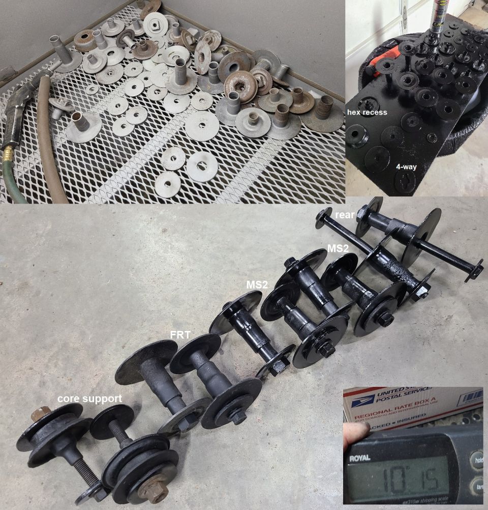 Collection of metal and rubber automotive body mounting parts, some labeled 'FRT', 'MS2', 'rear', and 'core support'