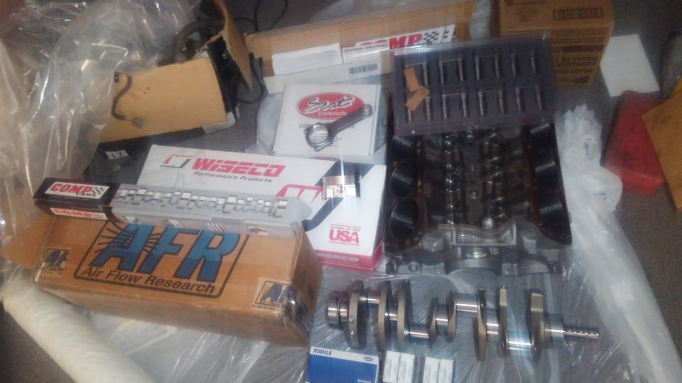 pretty much everything for building a longblock 410ci stroker. Stroker kit is from FordStrokers.com and the top end is from FlowTechinduction

F4TE 351w engine block bored .040 over
RPM 4.000" stroke internal balance crankshaft
SCAT 6.2" H beam rods
Wiseco forged  22cc dish pistons
Clevite HX bearings
AFR 205 cylinder heads
Custom billet FTI camshaft hydraulic roller
Morel hydraulic roller linkbar lifters