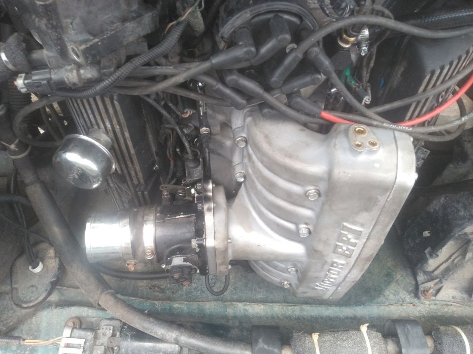 running an Edelbrock Victor EFI intake as recommended by the cam designer. these are no longer made so i had to buy this one used. it fits well but is too high to add any kind of spacer.

the throttle body is just my old 75mm which i plan on replacing soon