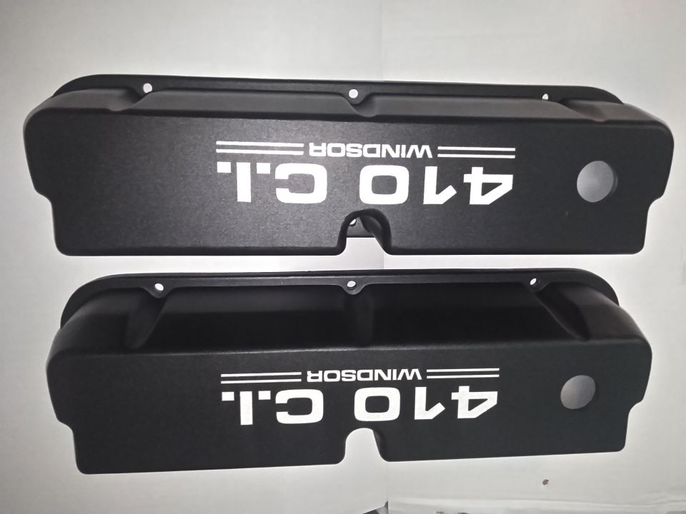 had these custom valve covers made by AnsenValveCovers. i needed new valve covers any way that were taller. just wanted alittle more personalization and something less flashy than my old worn Bronco covers