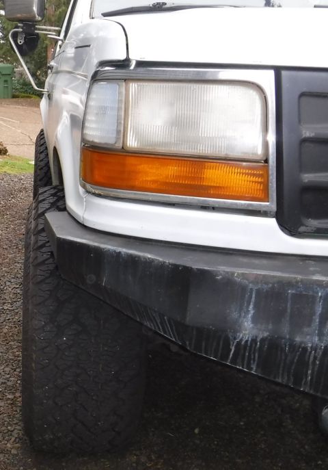 1992 Ford Bronco - New 15x10 wheels, Pro Comp 69 / 1069, front view.