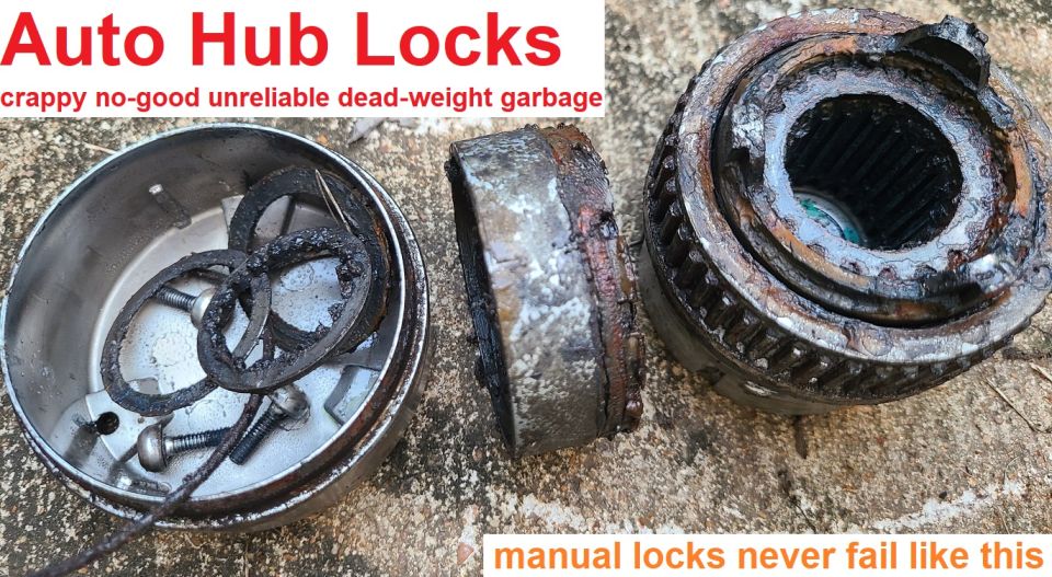 Auto Hub Locks SUCK!!! . . . . ...right?
IF THE IMAGE IS TOO SMALL, click it.

As bad as this looks, and despite the fact that it isn't working at the moment, there's nothing wrong with this 3-screw auto hub lock that can't be fixed with cleaning. And considering that this much water got past the 3 screws & wide O-ring of this cap, even more would have gotten in through the 5~6 screws, thin cap O-ring, and knob O-ring of a manual lock. It would also have done more rust-damage to those thinner springs. So manual hub locks are more-sensitive to neglect than autos. The only reason they seem to last longer is that they tend to be installed on trucks that need more hub maintenance anyway, so manuals get serviced more. But manual hub locks CAN & DO fail like this, and in even-worse ways.

After cleaning, this lock works perfectly. If it had been serviced the way Warn (the manufacturer) & Ford recommend (dunking in ATF twice a year), it never would have gotten this bad.
-----------------------------------------------------------
Today's free-running hubs are very simple to operate and feature seals that prevent the entry of dirt and moisture. Automatic locking hubs are used in many applications. They use the front axle shaft rotation to actuate a cam that locks and unlocks the hub.

There are two types of front hubs currently in use on Ford Trucks:
 ^ Manual (or free-running) that require the driver to get out of the cab to either lock or unlock them.
 ^ Automatic locking (they lock automatically when the axle shaft begins to turn).
The vehicle operator doesn't have to wait until the last minute (or when stuck) to lock the hubs. It makes sense to plan ahead and lock them at a convenient time. The hubs can be left in the locked position all the time if desired. For example, if the vehicle is constantly going from the highway to off the road conditions and back, it's not necessary to lock or unlock every time. If the vehicle is equipped with a manual shift transfer case and manual locking hubs, low range can be selected when the vehicle's front hubs are unlocked. This is useful for short distances if very low, creeper gearing (but not 4WD) is needed. For example, backing an empty boat trailer down a launching ramp is best accomplished in 2WD. Once the boat is loaded, 4L (low) can be selected to help pull the boat up the ramp. The hubs don't have to be locked for this purpose, and being in 2WD will prevent driveline windup while maneuvering in the boat ramp parking lot.