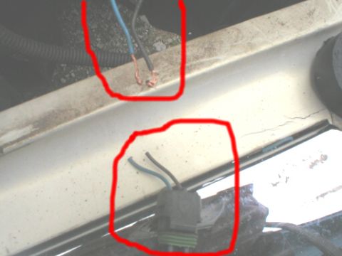 1987 Ford Crown Victoria LTD - Close-up view of a wiring harness and connector, highlighted with red circles.