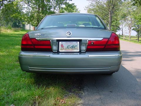 2003 Mercury Grand Marquis - The dealer name plate has been removed since this shot was taken. This is a good view of the new tail light and trunk fascia treatment.