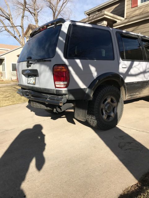 2000 Ford Explorer - Rear view of a 2000 Ford Explorer showing its bumper and dual exhaust pipes.