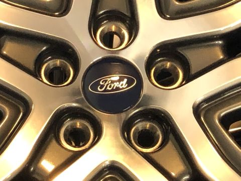 2019 Ford Everest - A close-up, angled shot of a Ford Everest wheel shows the Ford logo in the center. The wheel has five spokes with lug nut holes visible.