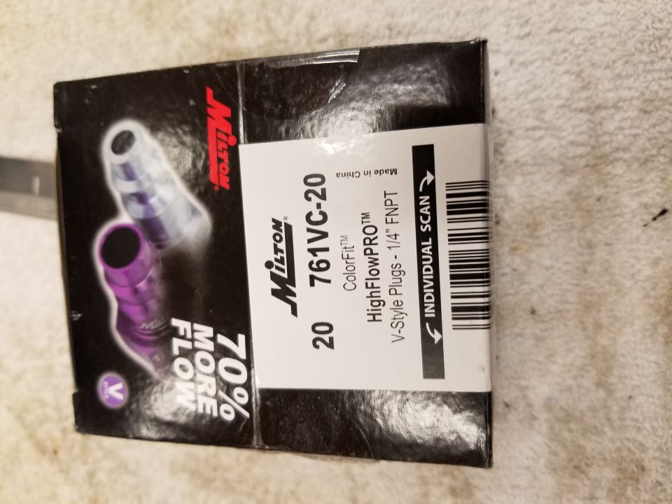 Box of Milton HighFlowPRO V-Style Plugs, model 761VC-20, showing purple and clear plugs