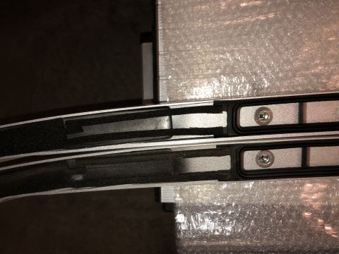 2019 Ford Everest - Close-up of new roof rack crossbars, likely for an SUV or truck, showing mounting details.