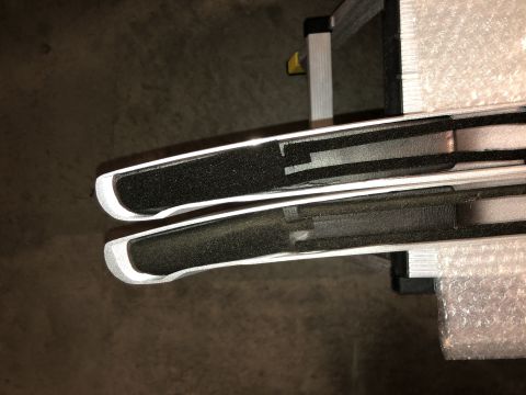 2019 Ford Everest - Close-up of two roof rack crossbars, possibly for sale or installation.