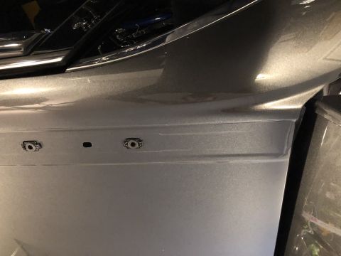 2019 Ford Everest - Car bumper detail with visible mounting points and a central slot.