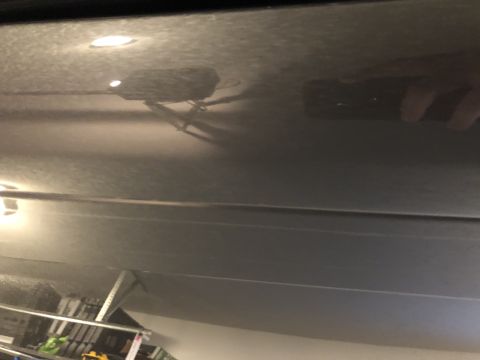 2019 Ford Everest - This image shows a part being replaced on a vehicle's roof rack.