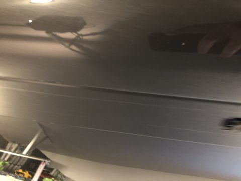 2019 Ford Everest - Shadow of a roof rack is visible on the dark surface of a car's roof.