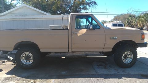1990 Ford F-250 - new front and rear leafs on 33 inch tires. might have to consider 35 inch tires next time