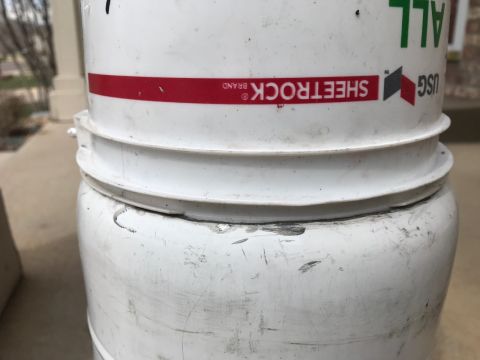 2000 Ford Explorer - Stacked buckets, one labeled Sheetrock Brand, with a SuperMotors watermark at the bottom.