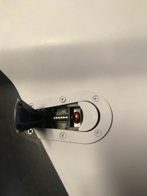 2000 Ford Explorer - Close-up of a vehicle's interior door latch mechanism, showing internal components.