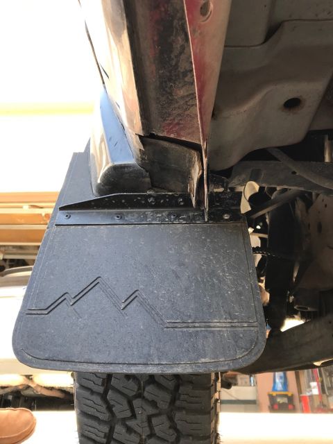 2000 Ford Explorer - This image shows a mud flap with a mountain graphic, not a 2000 Ford Explorer.