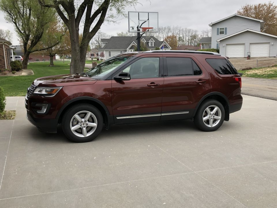 Maroon 2016 Ford Explorer, side view