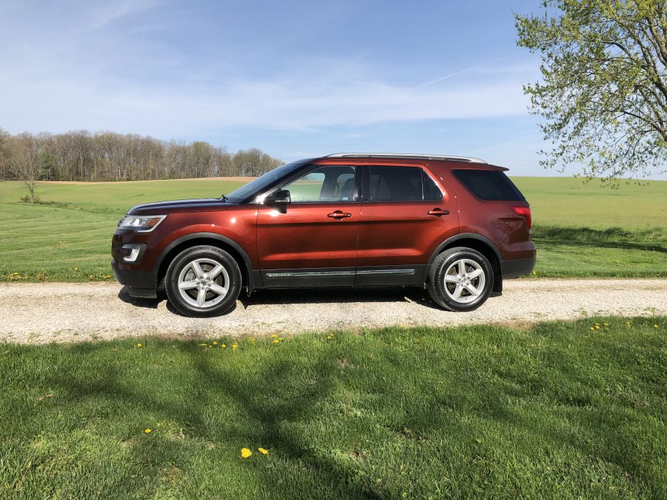 Orange 2016 Ford Explorer side view