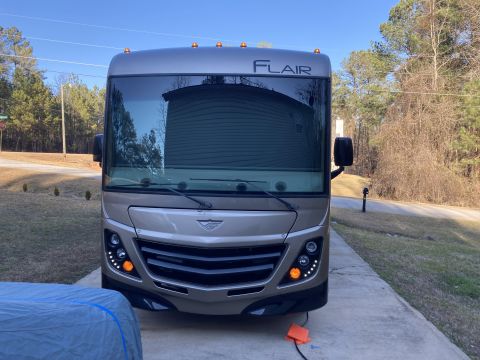 2015 Ford F-550 - This motorhome features a prominent FLAIR badge above the windshield and a distinctive front grille design.