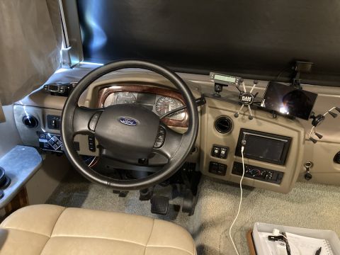 2015 Ford F-550 - Interior view of an RV's dashboard, showing the steering wheel and control panel.