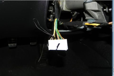 2010 Hyundai Genesis - Wiring harness connector with multiple wires visible, likely part of a vehicle's electrical system.