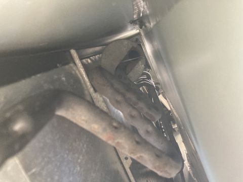 2015 Ford F-550 - Underside view shows exhaust pipes and wiring, not a 2015 Ford F-550.