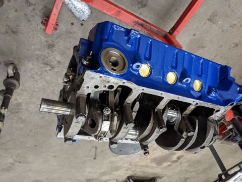 1996 Ford Bronco - Finally going back together after the block was cleaned, honed, and painted. Pistons got new moly rings, crank polished, and new clevite be…