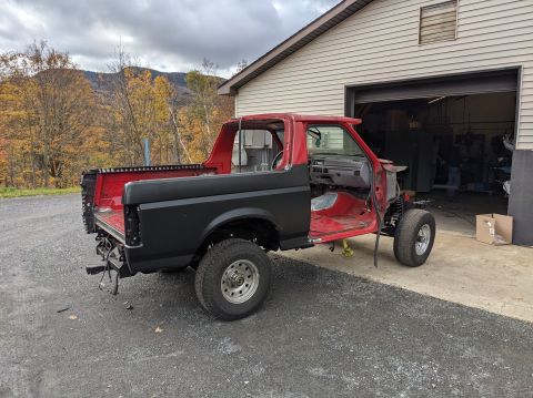 1996 Ford Bronco - Body back on. Starting on the body work. New rear quarter panels to replace the patched ones.