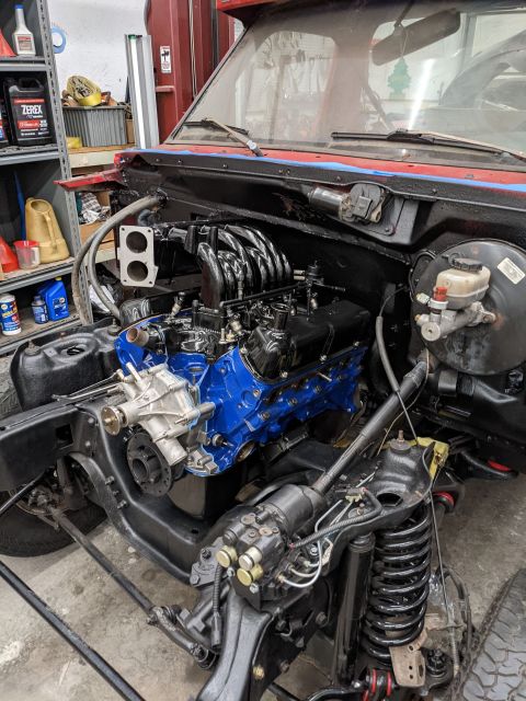 1996 Ford Bronco - Dropping the engine in.
