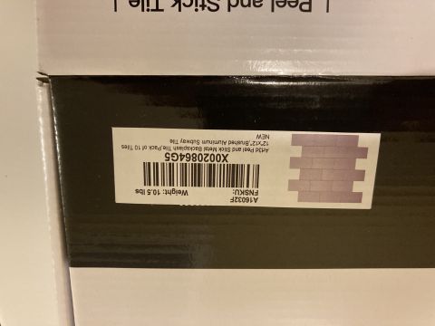 2015 Ford F-550 - This box contains 10 tiles of 12x12 inch brushed aluminum subway tile backsplash.