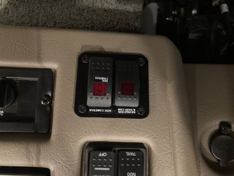 2015 Ford F-550 - Interior dashboard switches for side cameras and navigation/dash cam are visible.