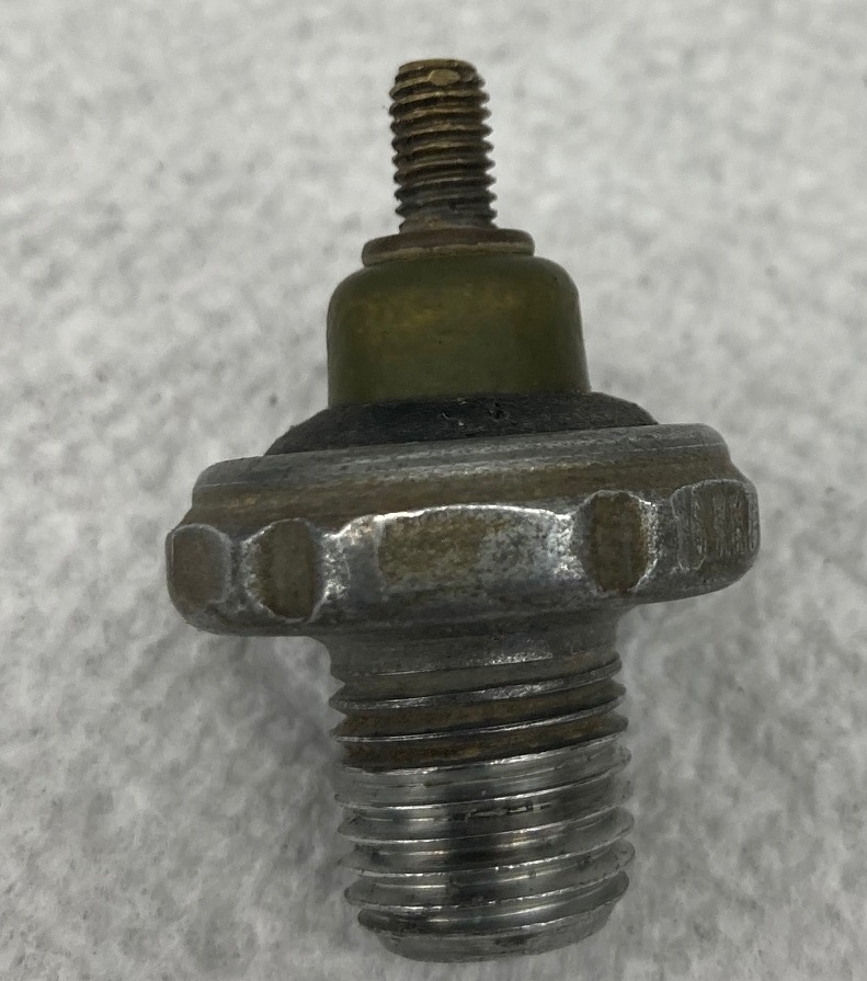 Oil pressure sending unit with threaded ends and a green top