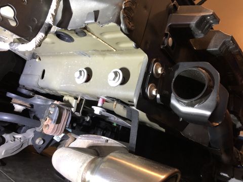 2019 Ford Everest - Close-up of a tow hitch receiver installation on a vehicle's undercarriage.