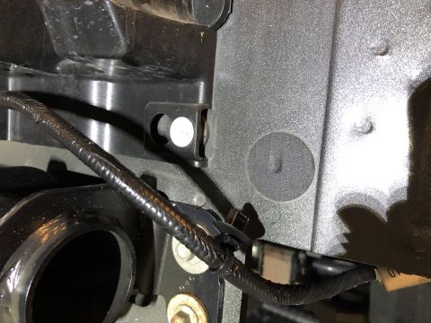 2019 Ford Everest - Wiring harness and mounting bracket detail on a vehicle component.