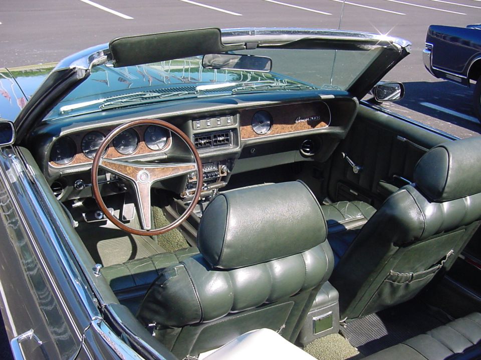 '69 Cougar interior.  Ted's Car, parked next to me. When he pulled in he left a huge space between us.