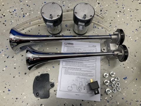 2015 Ford F-550 - This photo shows an air horn kit, including trumpets, air tanks, and installation instructions.