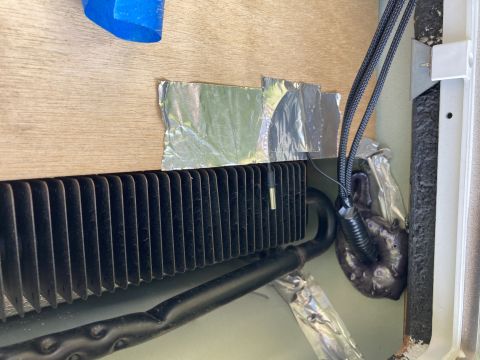2015 Ford F-550 - This image shows a close-up of refrigerator components, not a 2015 Ford F-550.
