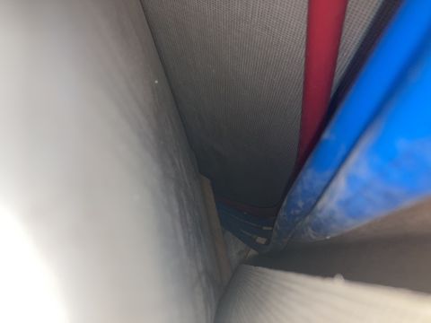 2015 Ford F-550 - Close-up view of plumbing pipes, likely within a vehicle's interior space.