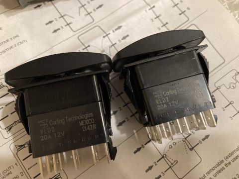 2015 Ford F-550 - Two Carling Technologies VLD2 switches are shown, each rated for 20A and 12V, with their electrical pin connectors visible.