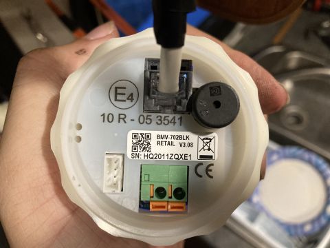 2015 Ford F-550 - Close-up of a Victron BMV-702 Black battery monitor, showing its serial number and retail version.