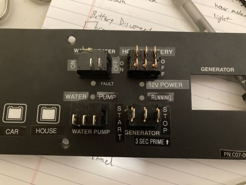 2015 Ford F-550 - RV control panel shows switches for water pump, generator, and power sources like car and house.