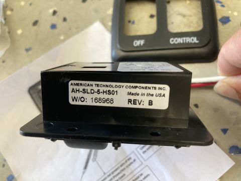2015 Ford F-550 - A close-up view of an electronic control module with a label indicating its manufacturer and part number.