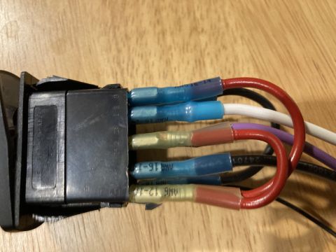 2015 Ford F-550 - Wiring connected to a switch, showing various colored wires and insulated connectors.