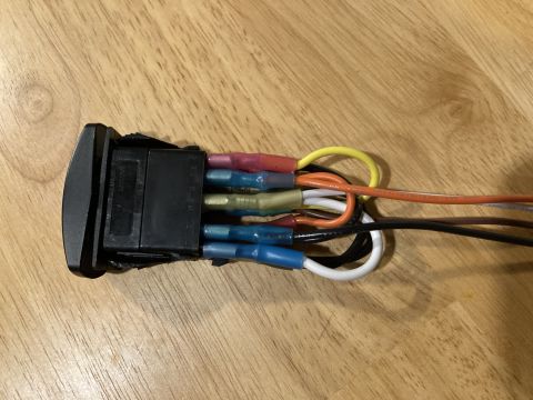2015 Ford F-550 - Aftermarket switch with wires connected, likely for accessory installation.