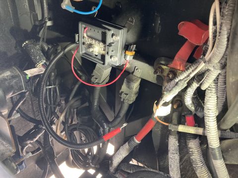 2015 Ford F-550 - Vehicle electrical system detail showing a fuse box and battery connections.