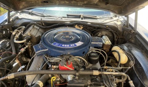 1975 Ford Ranchero - The engine bay of a 1975 Ford Ranchero, the 460-4V engine and air cleaner assembly.