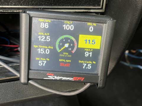 1975 Ford Ranchero - A Holley Sniper EFI digital gauge displays various engine parameters including RPM, temperature, and air-fuel ratio.