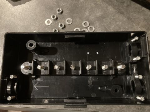 2015 Ford F-550 - A black plastic housing for a wiring harness connector is shown with several metal terminals and labels.